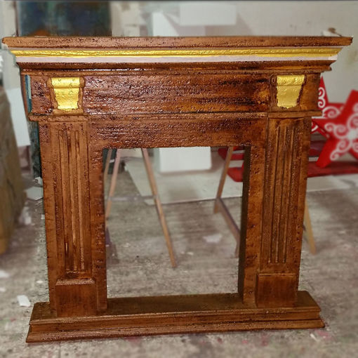 Immagine di Caminetto in Polistirolo con finiture color oro
